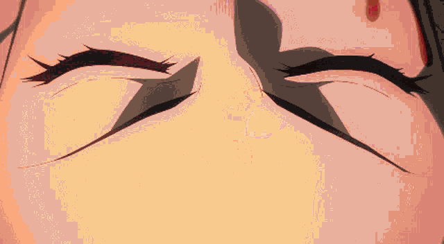 a close up of a person 's eyes with red circles around them .