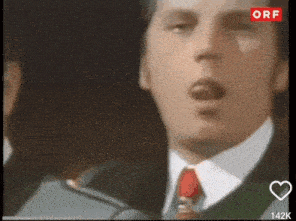 a close up of a man 's face with the word orf on the bottom right corner