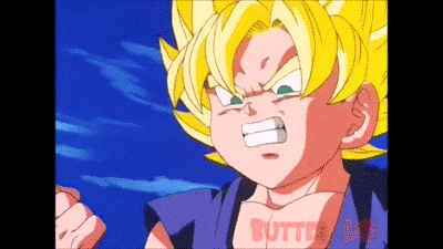 a close up of a cartoon character with yellow hair and green eyes