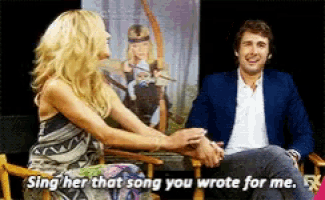 a man and a woman holding hands with the words sing her that song you wrote for me on the bottom