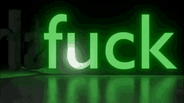 the word fuck is glowing in the dark