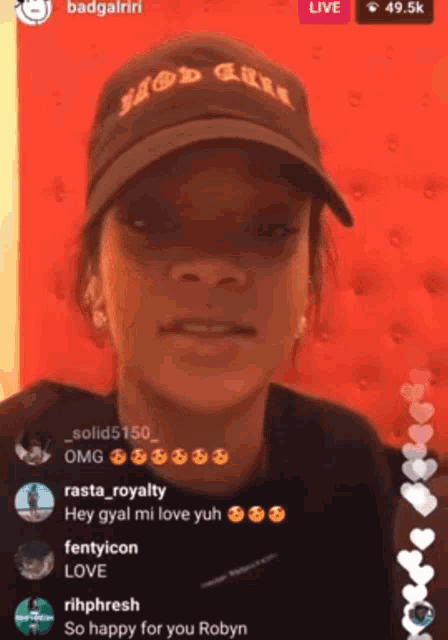 a woman wearing a hat that says hood girl on it