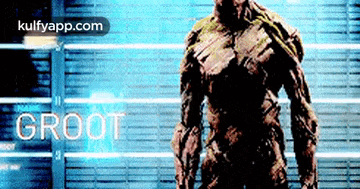 a picture of groot from the movie guardians of the galaxy standing in front of a wall