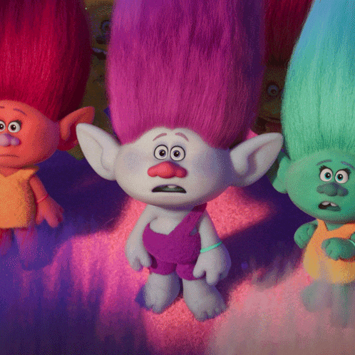 a group of trolls with different colors of hair