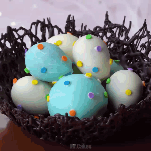 easter eggs in a chocolate nest with mr.cakes written on the bottom left