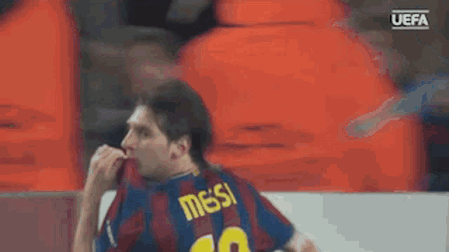 a soccer player wearing a jersey with the number 10 on it