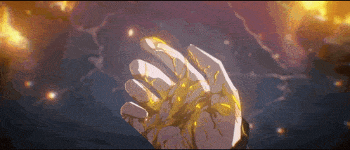 a close up of a person 's hand with a yellow substance coming out of it .
