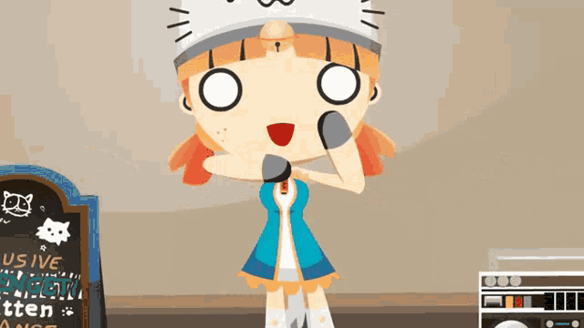 a girl in a cat hat is standing in front of a sign that says love cats