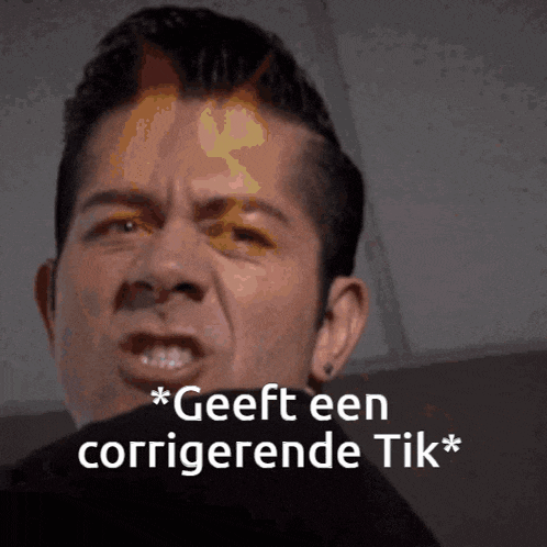 a close up of a man 's face with the words geeft een corrigerende tik