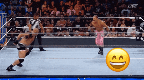 a wrestling ring with a smiley face on the floor