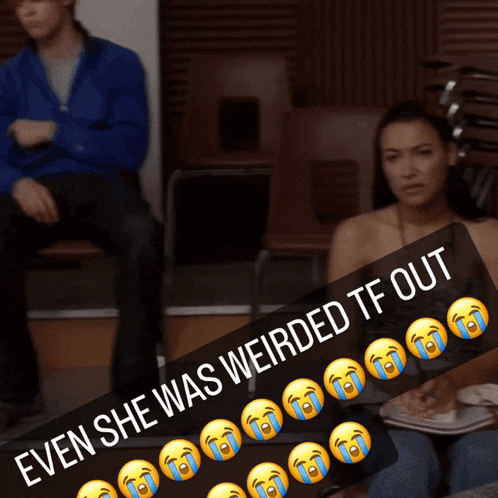 a woman sits in a chair with a caption that says " even she was weirded tf out "