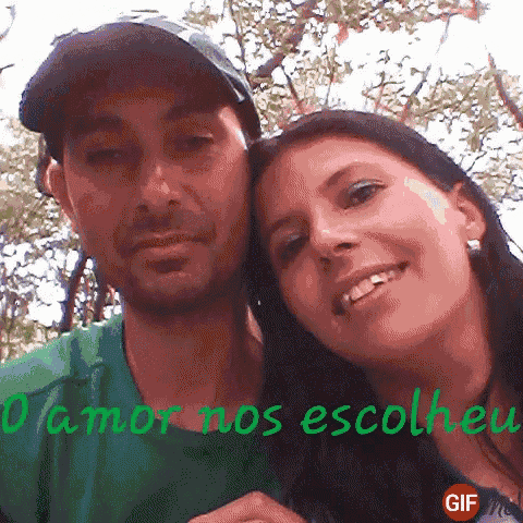 a man and a woman are posing for a picture with the words " amor nos escolher " on the bottom