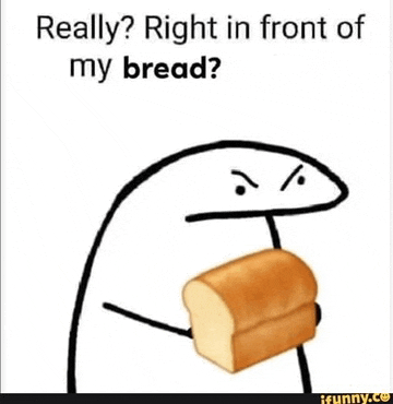 a cartoon character is holding a loaf of bread in his hand .