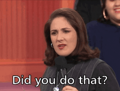 a woman speaking into a microphone with the words did you do that below her
