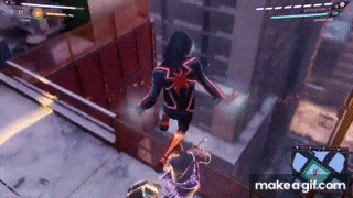 a spider-man video game is being played on a computer and a person is flying through the air .