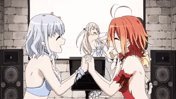 two anime girls are arm wrestling in front of a screen