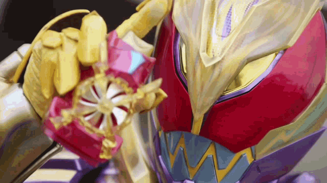 a close up of a person wearing a mask and holding a sword
