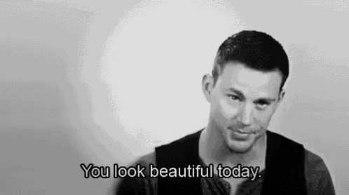 a black and white photo of a man with the words you look beautiful today