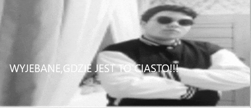 a black and white photo of a man with sunglasses and the words wyjebane gdzie jest to ciasto