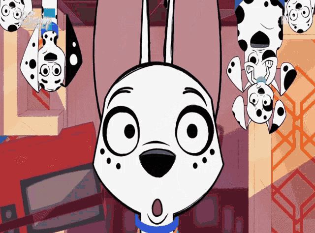 a dalmatian dog hanging upside down with a disney logo in the corner