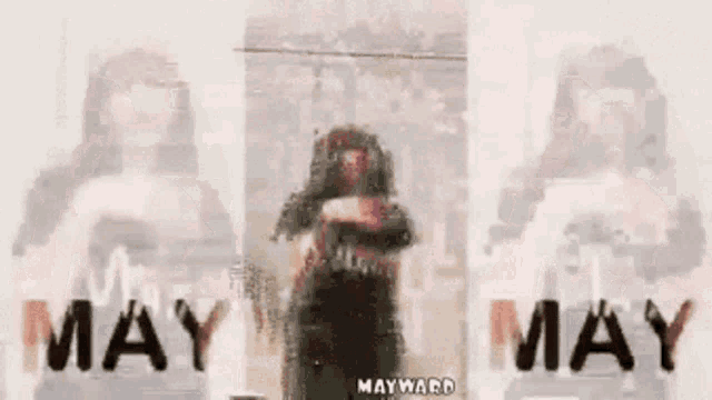 a girl wearing a shirt that says may