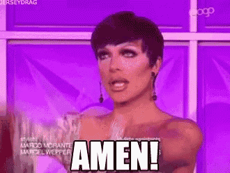 a woman with short hair is saying amen