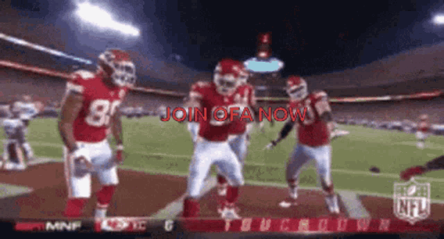 a group of football players are dancing on a field with the words " join ofa now "