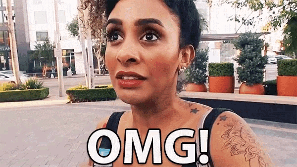 a woman with a tattoo on her shoulder says omg on the street