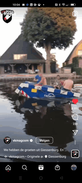 a phone screen shows a video of people in a boat with the time 10:04