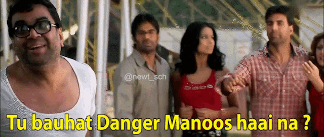 a group of people standing next to each other with the caption tu bauhat danger manoos hai na