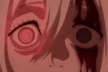 a close up of a person 's eyes with a swirl in the middle of them .