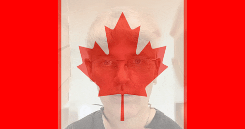 a man with glasses and a maple leaf behind his face