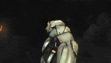 a man in a futuristic suit has a hand on his head