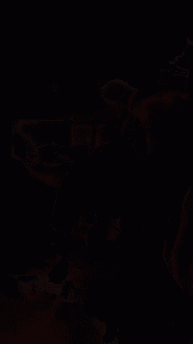 a girl in a striped top is kneeling down next to another girl