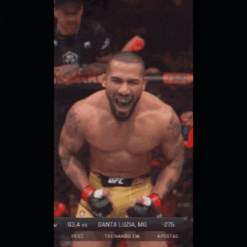 a shirtless ufc fighter celebrates his victory in santa luzia mg