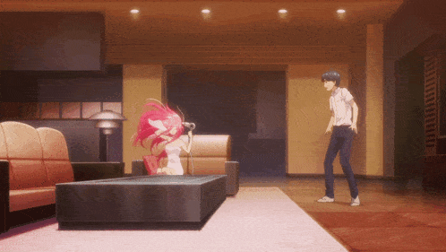 a man stands next to a girl with pink hair