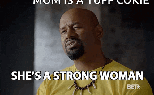 a man in a yellow shirt with a necklace says she 's a strong woman