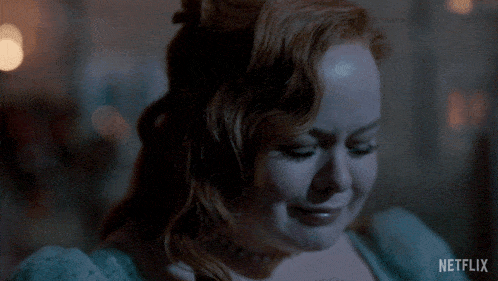 a woman is crying in a netflix video