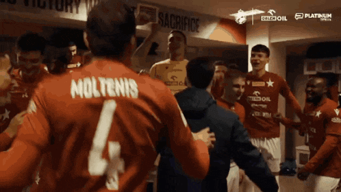 a group of soccer players including moltenis 4