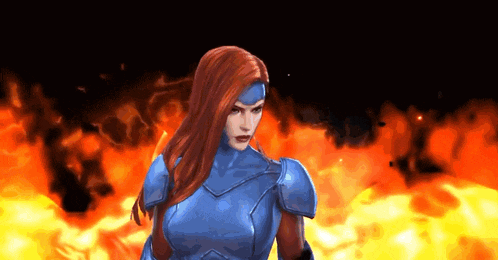 a woman in a blue armor is standing in front of a fire .