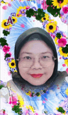 a woman wearing glasses and a hijab is surrounded by flowers and the letter a