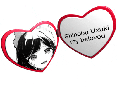 a heart shaped mirror with shinobu uzuki my beloved on it