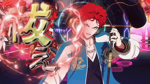 a man with red hair and a blue jacket is holding a microphone in his hand