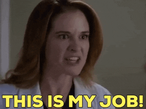 a woman in a white lab coat says this is my job