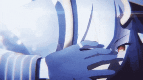 a close up of a person covering their face
