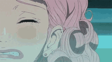 a woman with pink hair is crying with a tear coming out of her eye