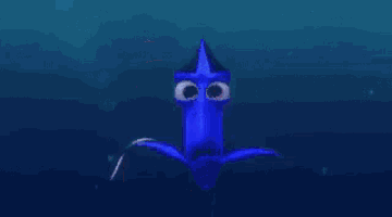 a close up of dory 's eyes with the words `` tu es la ? ''