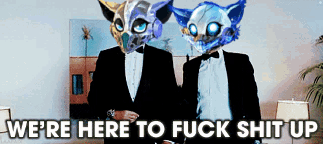 two men in tuxedos are standing next to each other with the words " we 're here to fuck shit up " above them