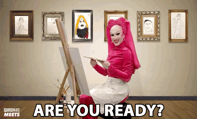 a woman is painting on an easel with the words " are you ready " below her