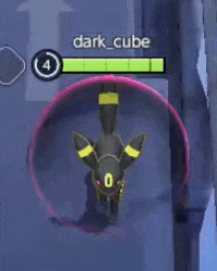a pokemon in a video game is surrounded by a red circle with the name dark cube on it .